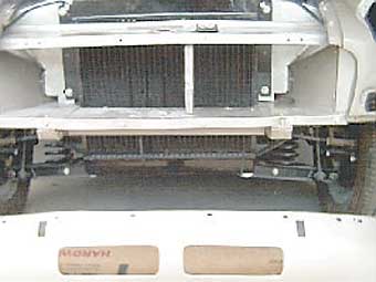 Heavy duty radiator fitted. Air holes put in front valance to increase air flow.