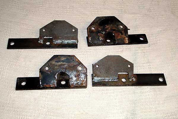 Lowering motor mounts (shown at upper left and lower right.)