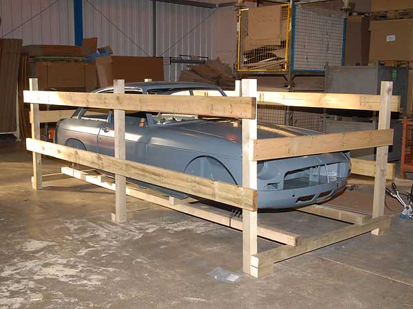 MGB-GT bodyshell being crated for shipment
