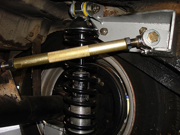 The upper chassis mount uses the old shock absorber mounting holes.