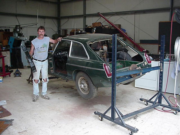Carl Floyd beginning disassembly of the MGB GT