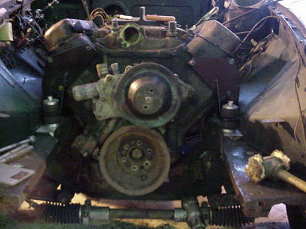 Trial installation of a big block Buick engine and newly fabricated motor mounts.