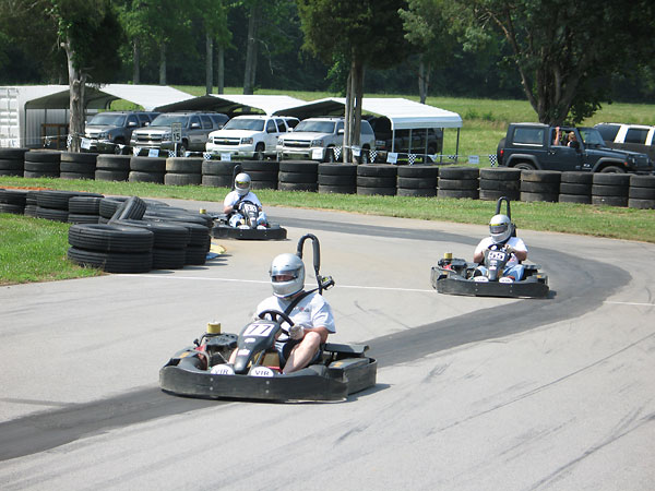 Graham Creswick, Richard Moor and Steve Degroat entering the front straight.