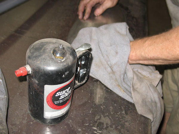 This handy Sure Shot dispenser has a little lacquer thinner in it. We used it to remove the WD-40.
