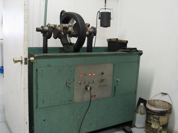 The Magnaflux machine is used to check for cracks.