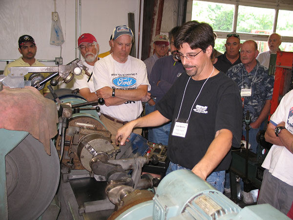 Crankshaft mounted on the Winona Van Norman CG250 crankshaft grinder.