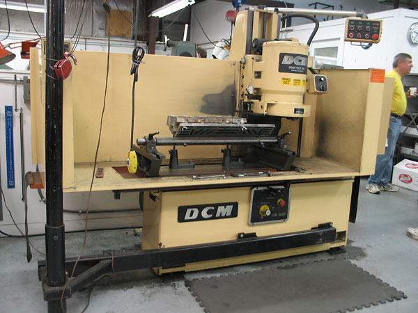 DCM Tech surface grinder. Surfacing a head removes warpage and slope.