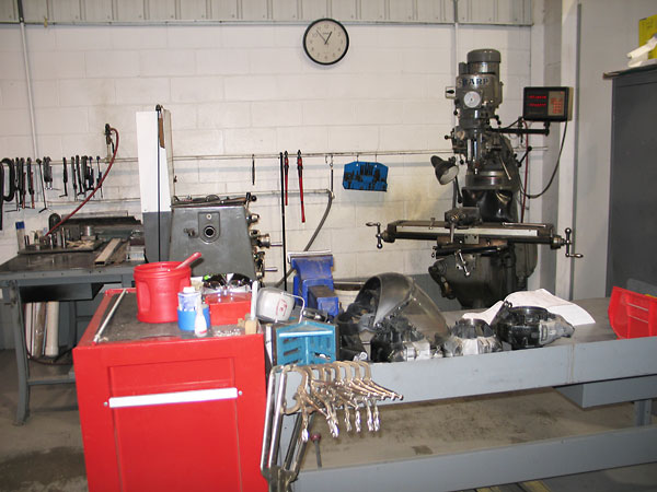 A machine shop wouldn't be complete without a lathe and a milling machine.