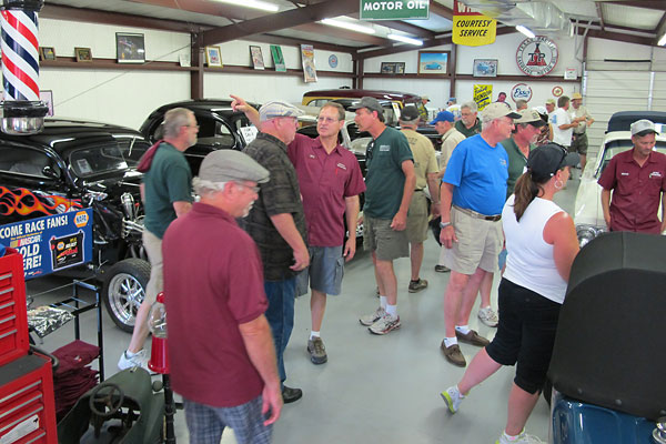 Gary Hatfield welcomes BritishV8 2012 participants to the Hatfield Restorations display room.