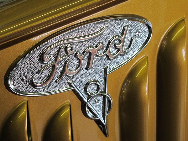 Ford V8 emblem.