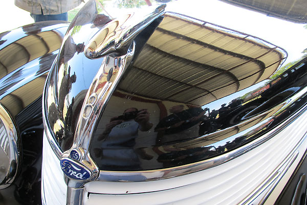 Ford V8 hood ornament.