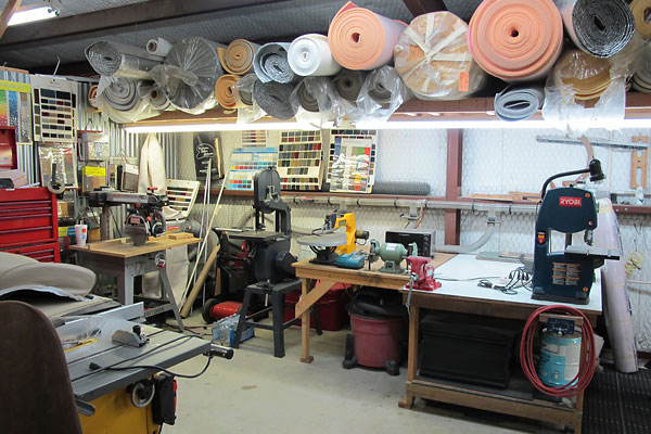 table saw, radial arm saw, band saw, scroll saw, bench grinder, another band saw.