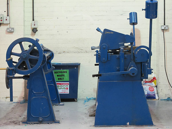 Two robust but manually operated machines: a slip roll (left) and a brake (right).