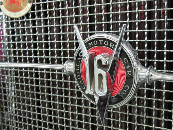 Badge: V16 - Cadillac Motor Car Co.