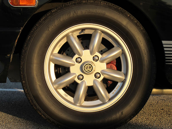Minator (KN Wheels Ltd.) eight spoke aluminum wheels.