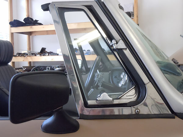 Late model MGB side view mirrors are available in flat black or bright metal.
