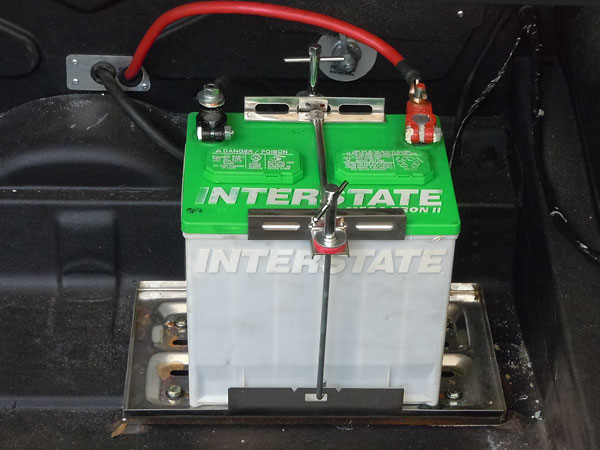Interstate battery, has been relocated to trunk.