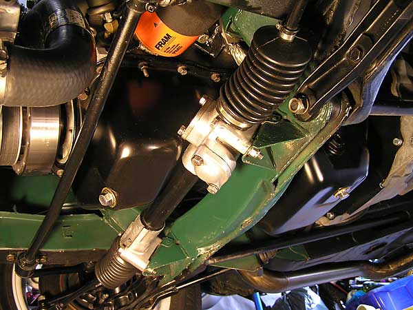 Ford's split oil sump straddles the MGC crossmember and rack neatly.