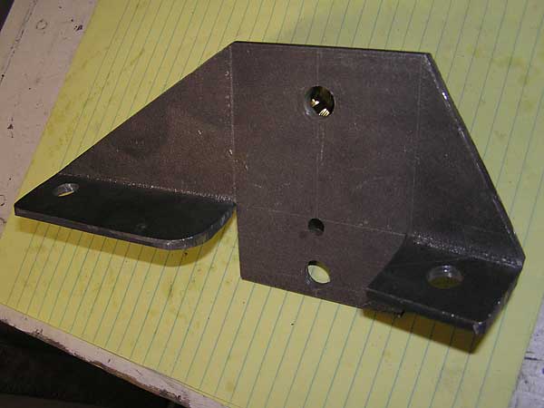 MGC motor mounts were used. Fabricated adapters go on the engine side.