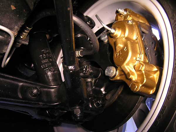 Toyota brake caliper works with stock rotor, but has significantly larger pad area.