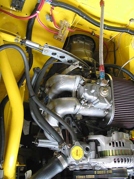 Weber 48DCO side draft carburetor. Racing Beat manifold.
