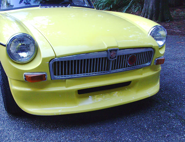 Front spoiler with stock grille.