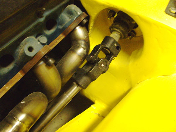 Steering shaft and header on driver's side.