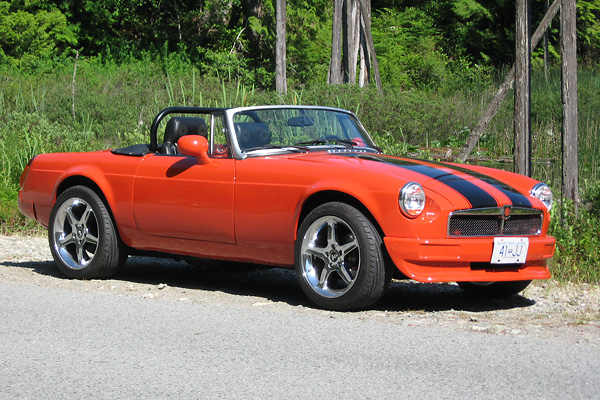 Fiberglass front bumper with integral air dam.