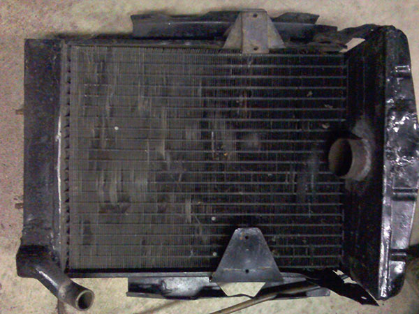 Stock MG TD radiator.