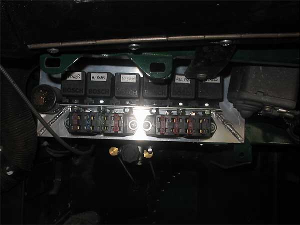 Fuse and relay power-block. Brake proportioning valve also shown.