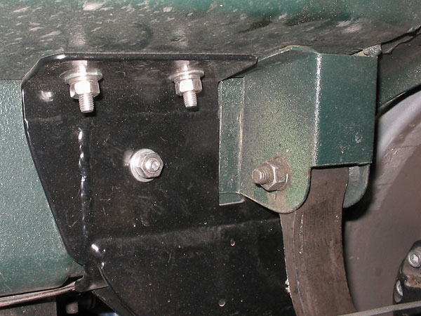 The Panhard rod's body mount features a cut-out to clear the rebound strap bracket.