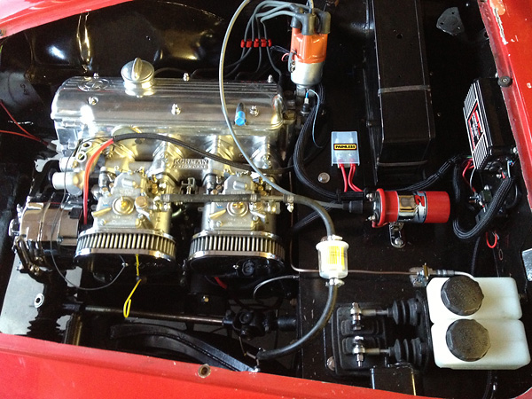 Korman intake manifold. Twin Weber 40mm DCOE carburetors. K&N air filters.