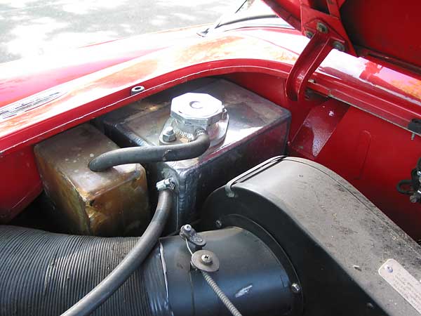 Fabricated reserve coolant/expansion tank and over-flow tank.