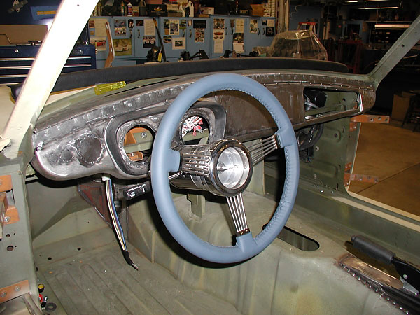 Various holes in the original dash were filled-in to make room for air conditioning vents.