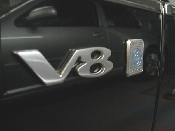genuine V8 fender badge and embossed-style British Leyland badge
