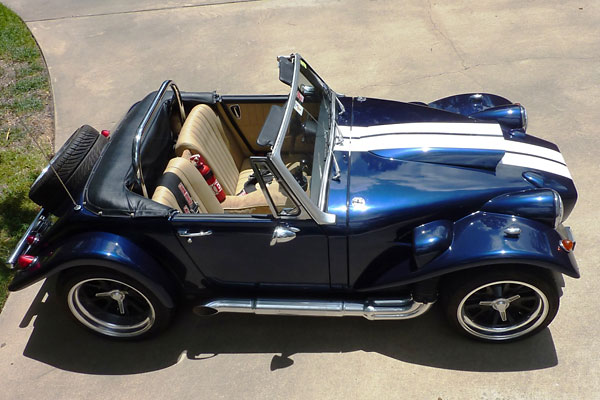 Arkley produced fiberglass body kits to give MG Midgets an old-school roadster look.