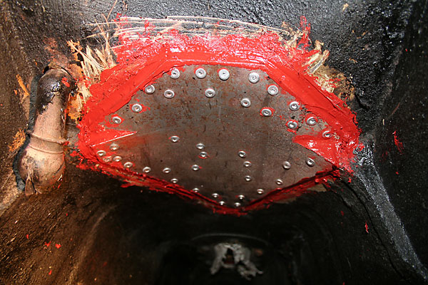 Transmission tunnel modification accomodates the height of the LT77 gearbox.