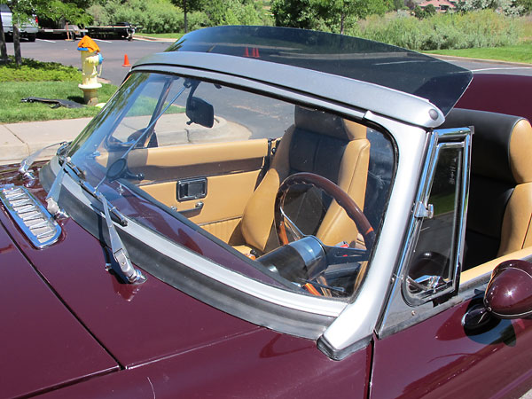 Mike Moor conceived this wind deflector, made from the header of an old convertible top.