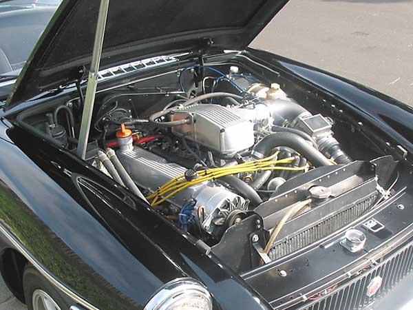 Rover hot-wire EFI looks right at home under Edd's standard MGB hood