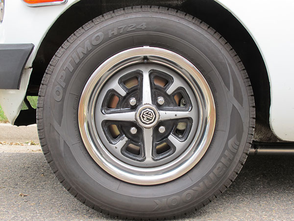 Stock MGB Rostyle steel wheels.