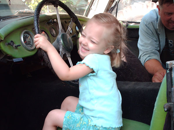 Harry's granddaughter takes the newly found MGA for a spirited test drive.