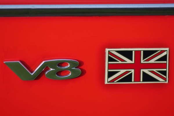 V8 and British flag badges.