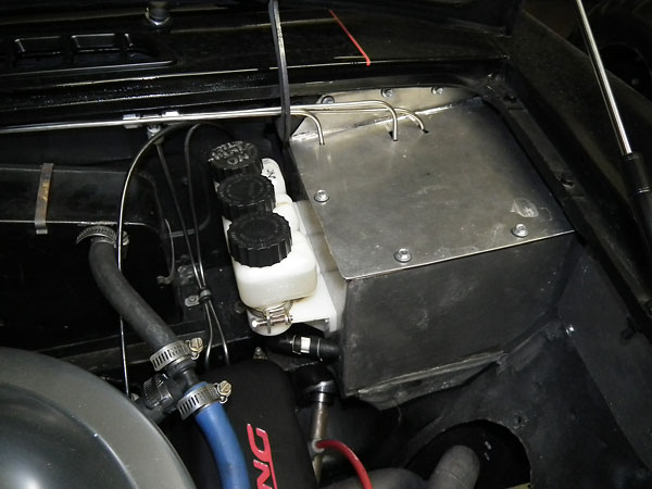 Master cylinder enclosure and access cover.