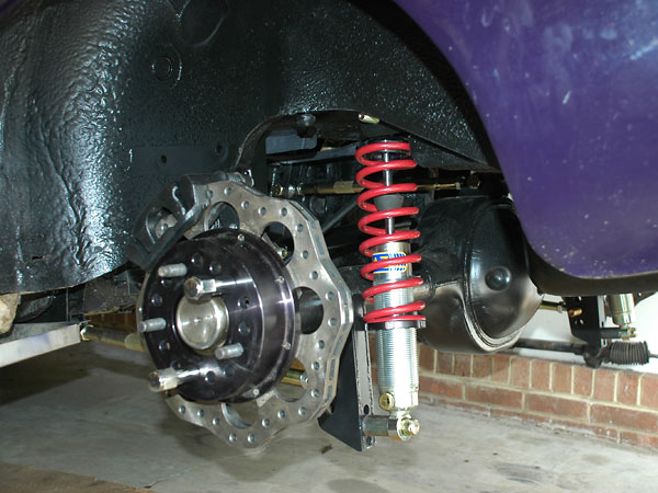 Gaz single adjustable coilover shock absorbers. Eibach 200# rear springs.