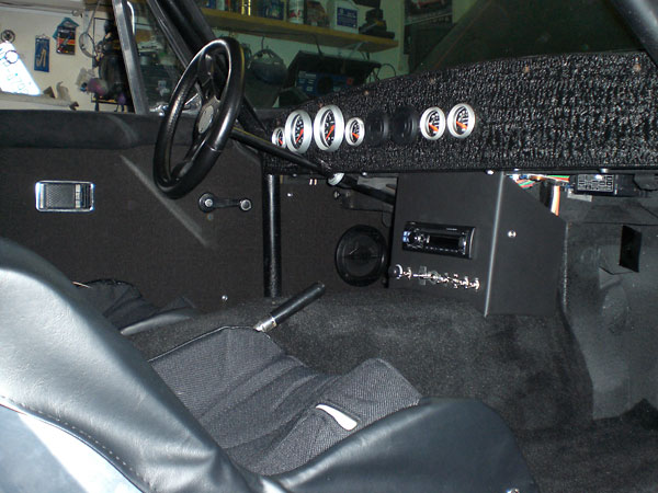 Custom aluminum dashboard, painted with black crinkle paint.