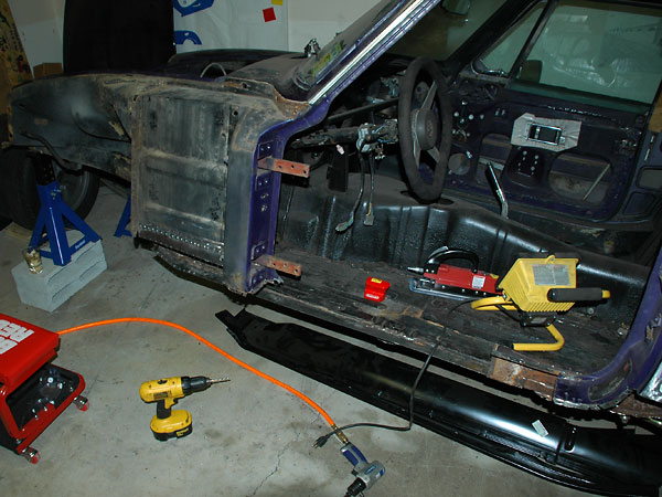 Replacing rocker panels, rear dog-leg panels, sections of the floorboard.