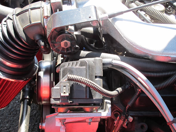 Throttle cable connection on the throttle body.