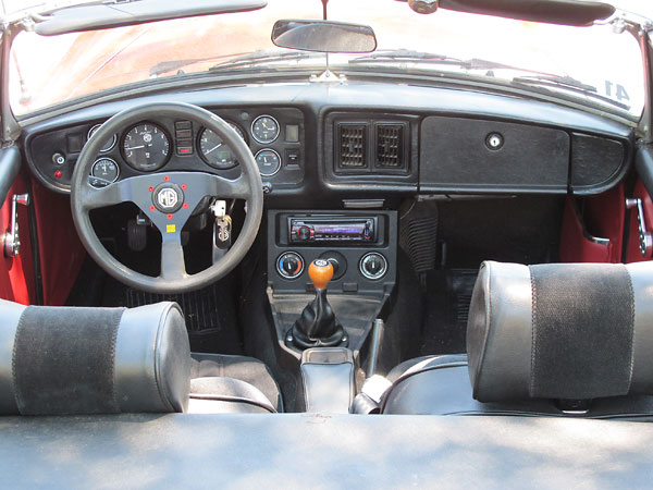 MGB gear shift lever has been grafted onto a Chevy/T5 gear shifter mechanism.