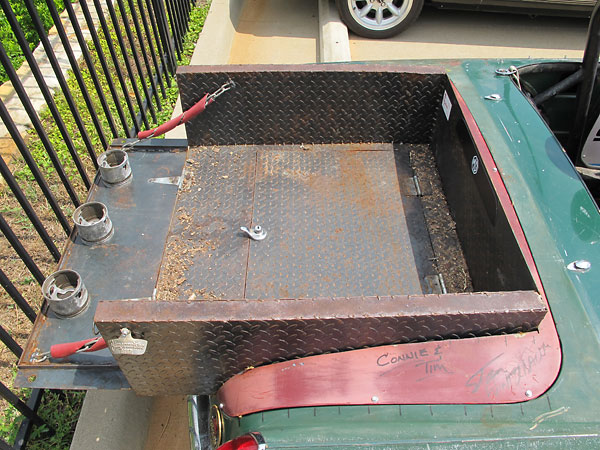 Small pickup truck bed made from steel diamond plate.