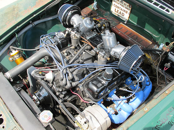 Intake manifold and S.U. carburetors are from a late sixties Rover 3500.